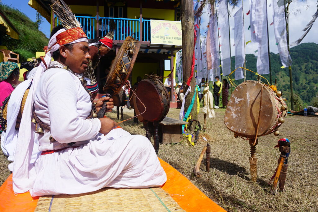 A Dhami jhankri, nepalese shaman playing the sacred drum, Dhyangro